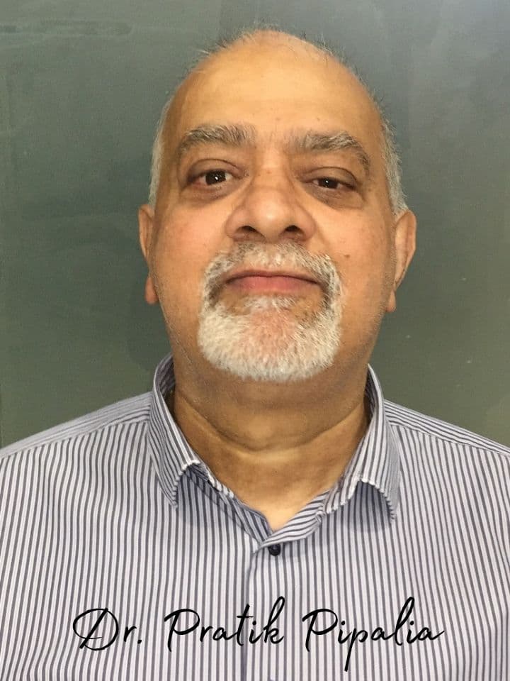 Bharatbhai P from UK after dental implant at Aarogyam Dental Clinic Rajkot Gujarat — dental tourism patient